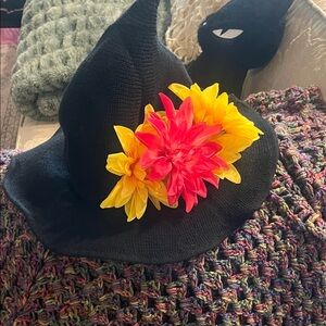Stylish Black Hat with Bright Floral Accent
